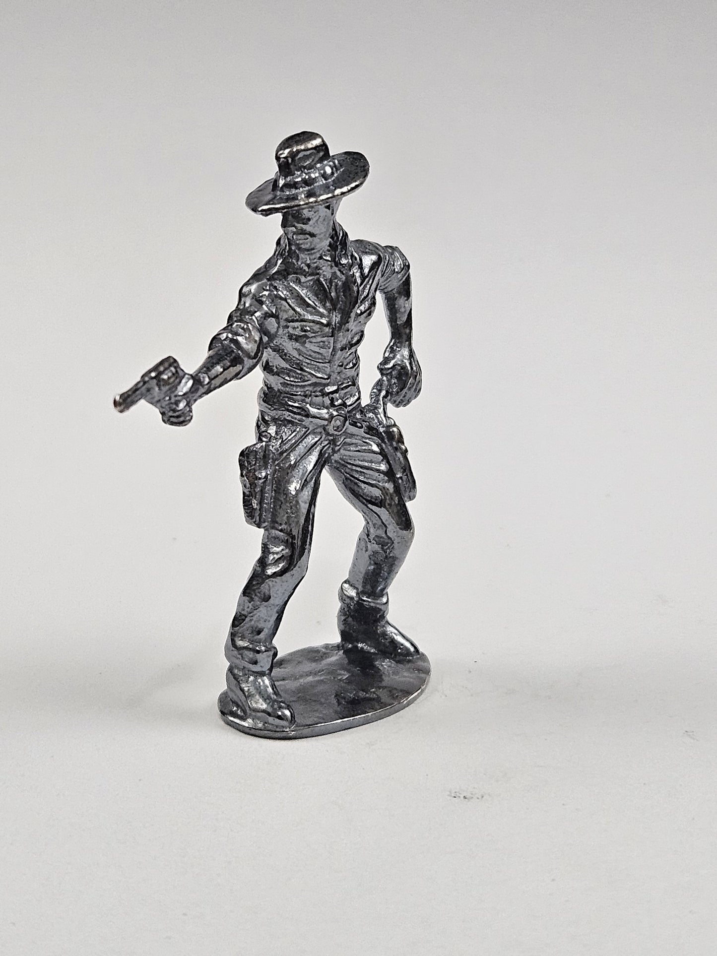 Gunslinger cowboy hand cast Bullion .999 Fine Silver Dark Finish