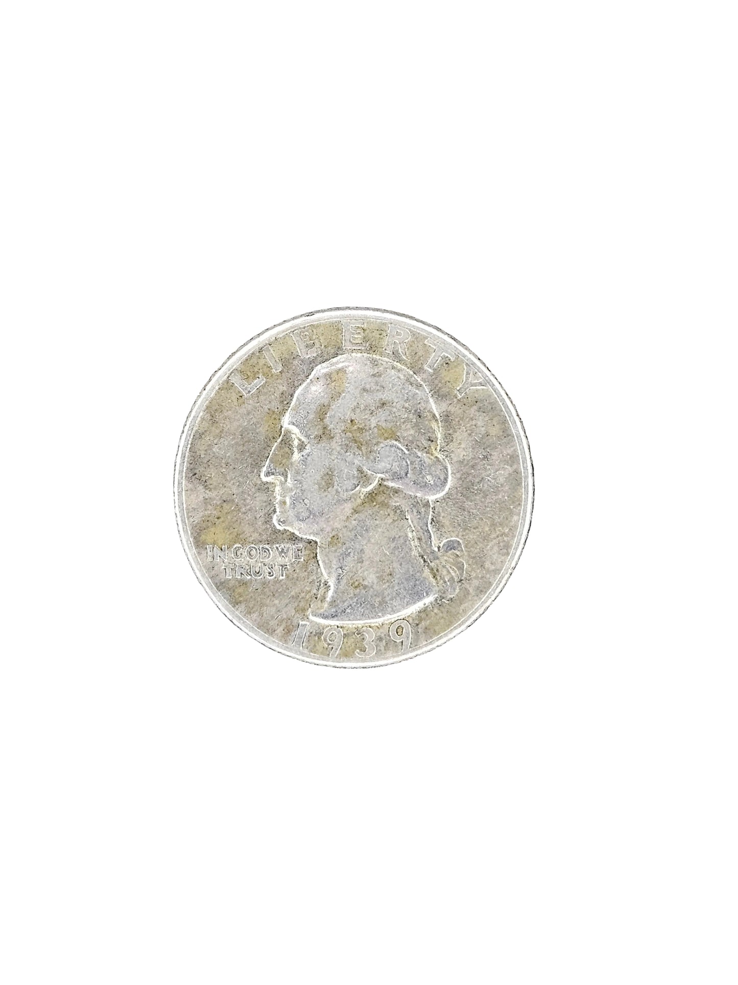 A silver US quarter coin showing the profile of George Washington, placed on a dark, weathered wood surface.