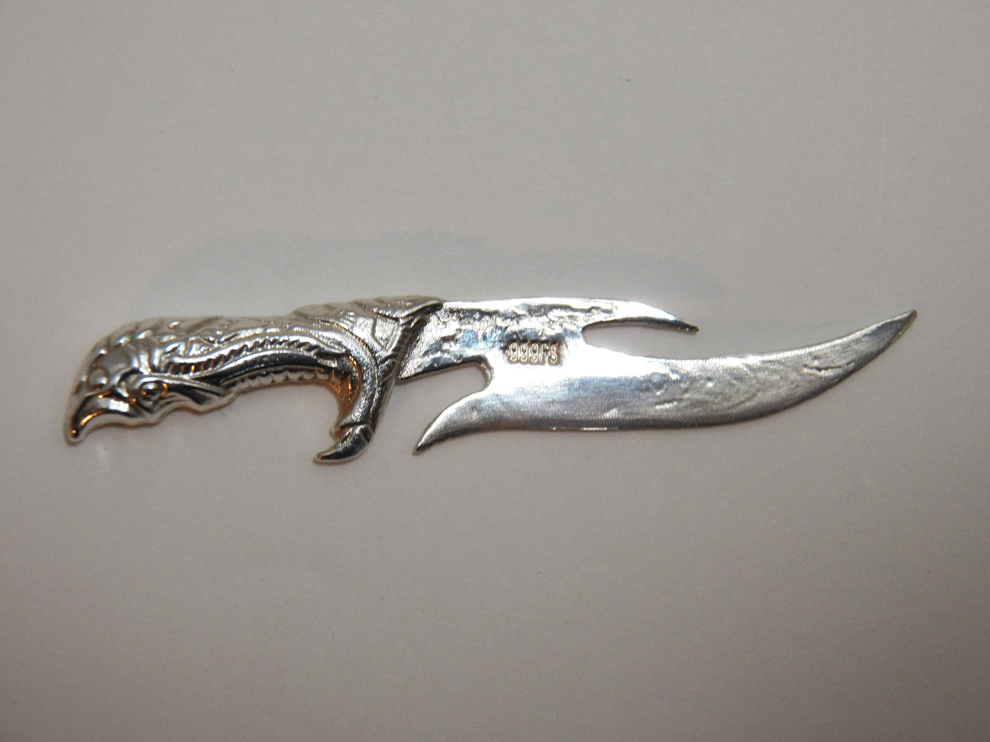 Knife Hand poured 999 fine silver